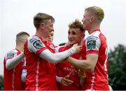 30 June 2023; Sam Curtis of St Patrick's Athletic, centre, celebrates after scoring his side's third goal with Chris Forrester, left, and Jay McGrath during the SSE Airtricity Men's Premier Division match between St Patrick's Athletic and UCD at Richmond Park in Dublin. Photo by Stephen Marken/Sportsfile