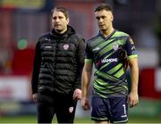 30 June 2023; Derry City manager Ruaidhrí Higgins, left, with goalkeeper Brian Maher after the SSE Airtricity Men's Premier Division match between Shelbourne and Derry City at Tolka Park in Dublin. Photo by Michael P Ryan/Sportsfile