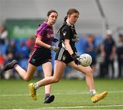 1 July 2023; Lauren Mooney of Maynooth in action against Siena Ryan of Inbhear Scein Gaels during the John West Féile Peile na nÓg Finals 2023 at the Connacht GAA Centre of Excellence in Bekan, Mayo. Photo by Stephen Marken/Sportsfile