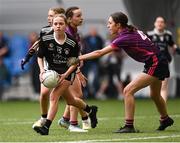 1 July 2023; Lucy Powderly of Maynooth in action against Siena Ryan of Siena Ryan during the John West Féile Peile na nÓg Finals 2023 at the Connacht GAA Centre of Excellence in Bekan, Mayo. Photo by Stephen Marken/Sportsfile