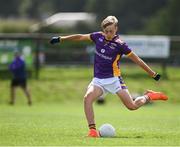 1 July 2023; Napog Keeling of Kilmacud Crokes scores his side's first goal from a penalty during the John West Féile Peile na nÓg Finals 2023 at the Connacht GAA Centre of Excellence in Bekan, Mayo. Photo by Stephen Marken/Sportsfile