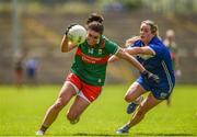 1 July 2023; Deirdre Doherty of Mayo in action against Ellen Healy of Laois during the TG4 LGFA All-Ireland Senior Championship match between Mayo and Laois at Hastings Insurance MacHale Park in Castlebar, Mayo. Photo by Tom Beary/Sportsfile