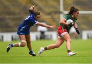 1 July 2023; Deirdre Doherty of Mayo in action against Orla Hennessy of Laois during the TG4 LGFA All-Ireland Senior Championship match between Mayo and Laois at Hastings Insurance MacHale Park in Castlebar, Mayo. Photo by Tom Beary/Sportsfile