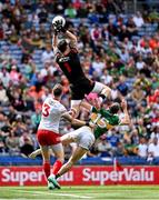 1 July 2023; Tyrone goalkeeper Niall Morgan catches the ball above teammate Ronan McNamee and Paul Geaney of Kerry during the GAA Football All-Ireland Senior Championship quarter-final match between Kerry and Tyrone at Croke Park in Dublin. Photo by Piaras Ó Mídheach/Sportsfile