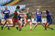 1 July 2023; Danielle Caldwell of Mayo on her way to scoring a point despite the tackles of Laura-Marie Maher, left, and Clodagh Dunne of Laois during the TG4 LGFA All-Ireland Senior Championship match between Mayo and Laois at Hastings Insurance MacHale Park in Castlebar, Mayo. Photo by Tom Beary/Sportsfile