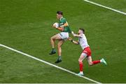 1 July 2023; David Clifford of Kerry catches a mark ahead of Pádraig Hampsey of Tyrone during the GAA Football All-Ireland Senior Championship quarter-final match between Kerry and Tyrone at Croke Park in Dublin. Photo by Brendan Moran/Sportsfile