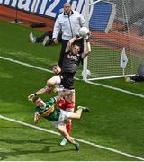 1 July 2023; Tyrone goalkeeper Niall Morgan catches a high ball ahead of teammate Ronan McNamee and Paul Geaney of Kerry during the GAA Football All-Ireland Senior Championship quarter-final match between Kerry and Tyrone at Croke Park in Dublin. Photo by Brendan Moran/Sportsfile