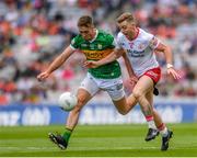1 July 2023; Michael O’Neill of Tyrone is tackled by Adrian Spillane of Kerry during the GAA Football All-Ireland Senior Championship quarter-final match between Kerry and Tyrone at Croke Park in Dublin. Photo John Sheridan/Sportsfile