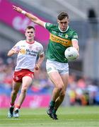 1 July 2023; David Clifford of Kerry as Ruairí Canavan of Tyrone looks on during the GAA Football All-Ireland Senior Championship quarter-final match between Kerry and Tyrone at Croke Park in Dublin. Photo by Piaras Ó Mídheach/Sportsfile