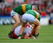1 July 2023; Cormac Quinn of Tyrone in action against Dara Moynihan and Paul Geaney of Kerry during the GAA Football All-Ireland Senior Championship quarter-final match between Kerry and Tyrone at Croke Park in Dublin. Photo by Ray McManus/Sportsfile