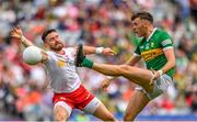 1 July 2023; David Clifford of Kerry has his shot blocked by Pádraig Hampsey of Tyrone during the GAA Football All-Ireland Senior Championship quarter-final match between Kerry and Tyrone at Croke Park in Dublin. Photo John Sheridan/Sportsfile