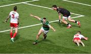 1 July 2023; Diarmuid O'Connor of Kerry celebrates after scoring his side's first goal past Tyrone goalkeeper Niall Morgan and defenders Ronan McNamee and Conn Kilpatrick during the GAA Football All-Ireland Senior Championship quarter-final match between Kerry and Tyrone at Croke Park in Dublin. Photo by Brendan Moran/Sportsfile