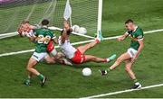 1 July 2023; Sean O'Shea of Kerry scores his side's second goal past Frank Burns and Michael McKernan during the GAA Football All-Ireland Senior Championship quarter-final match between Kerry and Tyrone at Croke Park in Dublin. Photo by Brendan Moran/Sportsfile
