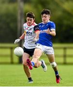 1 July 2023; Henry Whittleton of Laune Rangers in action against Rory Smith of New York during the John West Féile Peile na nÓg Finals 2023 at the Connacht GAA Centre of Excellence in Bekan, Mayo. Photo by Stephen Marken/Sportsfile