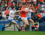1 July 2023; Ben Crealey of Armagh in action against Ryan McAnespie and Jason Duffy of Armagh, left, during the GAA Football All-Ireland Senior Championship quarter-final match between Armagh and Monaghan at Croke Park in Dublin. Photo by Ray McManus/Sportsfile