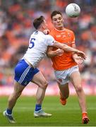 1 July 2023; Jarly Óg Burns of Armagh is tackled by Karl O'Connell of Monaghan during the GAA Football All-Ireland Senior Championship quarter-final match between Armagh and Monaghan at Croke Park in Dublin. Photo by John Sheridan/Sportsfile