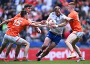 1 July 2023; Conor Boyle of Monaghan in action against Armagh players, from left, Andrew Murnin, Ben Crealey and Ciarán Mackin during the GAA Football All-Ireland Senior Championship quarter-final match between Armagh and Monaghan at Croke Park in Dublin. Photo by Piaras Ó Mídheach/Sportsfile