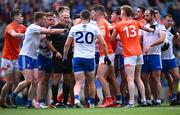 1 July 2023; Referee Conor Lane with players after he blew the full-time whistle at the end of normal time during the GAA Football All-Ireland Senior Championship quarter-final match between Armagh and Monaghan at Croke Park in Dublin. Photo by Piaras Ó Mídheach/Sportsfile