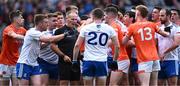 1 July 2023; Referee Conor Lane with players after he blew the full-time whistle at the end of normal time during the GAA Football All-Ireland Senior Championship quarter-final match between Armagh and Monaghan at Croke Park in Dublin. Photo by Piaras Ó Mídheach/Sportsfile