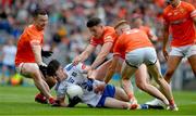 1 July 2023;  Stephen O’Hanlon of Monaghan is tackled by Aidan Forker, Ciaran Mackin and Joe McElroy of Armagh during the GAA Football All-Ireland Senior Championship quarter-final match between Armagh and Monaghan at Croke Park in Dublin. Photo by Ray McManus/Sportsfile