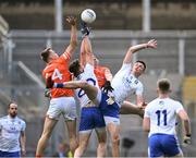 1 July 2023; Armagh players Rian O'Neill, left, and Shane McPartlan in action against Monaghan players Darren Hughes, 20, and Gary Mohan during the GAA Football All-Ireland Senior Championship quarter-final match between Armagh and Monaghan at Croke Park in Dublin. Photo by Piaras Ó Mídheach/Sportsfile