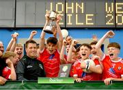 1 July 2023; Magherafelt captain Michael Higgins lifts the cup after his side's victory in the Division two cup final at the John West Féile Peile na nÓg Finals 2023 at the Connacht GAA Centre of Excellence in Bekan, Mayo. Photo by Stephen Marken/Sportsfile