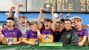 1 July 2023; Carryduff captain Aodhán McEvoy lifts the trophy after his side's victory in the Division one shield final at the John West Féile Peile na nÓg Finals 2023 at the Connacht GAA Centre of Excellence in Bekan, Mayo. Photo by Stephen Marken/Sportsfile
