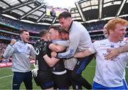 1 July 2023; Monaghan goalkeeper Rory Beggan, centre, celebrates with teammates after his side's victory in the penalty shoot-out of the GAA Football All-Ireland Senior Championship quarter-final match between Armagh and Monaghan at Croke Park in Dublin. Photo by Piaras Ó Mídheach/Sportsfile