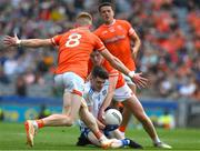 1 July 2023; Stephen O’Hanlon of Monaghan is tackled by Aidan Forker, Ciaran Mackin and Joe McElroy of Armagh during the GAA Football All-Ireland Senior Championship quarter-final match between Armagh and Monaghan at Croke Park in Dublin. Photo by Ray McManus/Sportsfile