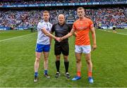1 July 2023; Referee Conor Lane with team captains Kieran Duffy of Monaghan and Rian O'Neill of Armagh before the GAA Football All-Ireland Senior Championship quarter-final match between Armagh and Monaghan at Croke Park in Dublin. Photo by Piaras Ó Mídheach/Sportsfile