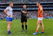 1 July 2023; Referee Conor Lane with team captains Kieran Duffy of Monaghan and Rian O'Neill of Armagh for the coin toss before the GAA Football All-Ireland Senior Championship quarter-final match between Armagh and Monaghan at Croke Park in Dublin. Photo by Piaras Ó Mídheach/Sportsfile