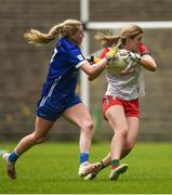 1 July 2023; Laura Brennan of Mayo is tackled by Laura Nerney of Laois during the TG4 LGFA All-Ireland Senior Championship match between Mayo and Laois at Hastings Insurance MacHale Park in Castlebar, Mayo. Photo by Tom Beary/Sportsfile