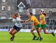 1 July 2023; Aoife Minogue of Meath in action against Emer  Ní Ghallchóir of Donegal during the TG4 Ladies Football All-Ireland Senior Championship match between Meath and Donegal at Páirc Tailteann in Navan, Meath. Photo by Michael P Ryan/Sportsfile
