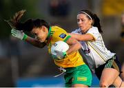 1 July 2023; Niamh Ní Eigeartaigh of Donegal in action against Niamh O'Sullivan of Meath during the TG4 Ladies Football All-Ireland Senior Championship match between Meath and Donegal at Páirc Tailteann in Navan, Meath. Photo by Michael P Ryan/Sportsfile