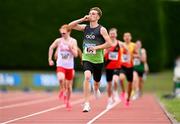 2 July 2023; Neil Culhane of Ace Athletics Club, Louth, celebrates on his way to winning in the Men's U20 800m event during the 123.ie Junior & U23 Track and Field Championships at Tullamore in Offaly. Photo by Ben McShane/Sportsfile