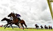 2 July 2023; Bucanero Fuerte, with Rossa Ryan up, on their way to winning The GAIN Railway Stakes from second place  Unquestionable with Ryan Moore during day three of the Dubai Duty Free Irish Derby Festival at Curragh Racecourse in Kildare. Photo by Matt Browne/Sportsfile