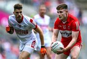 2 July 2023; Ethan Doherty of Derry in action against Ian Maguire of Cork during the GAA Football All-Ireland Senior Championship quarter-final match between Derry and Cork at Croke Park in Dublin. Photo by Piaras Ó Mídheach/Sportsfile