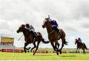 2 July 2023; Bucanero Fuerte, near side, with Rossa Ryan up, on their way to winning The GAIN Railway Stakes from second place  Unquestionable with Ryan Moore during day three of the Dubai Duty Free Irish Derby Festival at Curragh Racecourse in Kildare. Photo by Matt Browne/Sportsfile