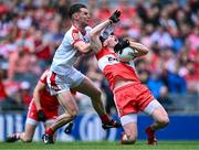 2 July 2023; Gareth McKinless of Derry is fouled by Maurice Shanley of Cork during the GAA Football All-Ireland Senior Championship quarter-final match between Derry and Cork at Croke Park in Dublin. Photo by Piaras Ó Mídheach/Sportsfile
