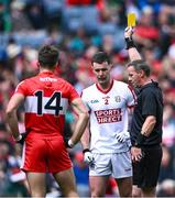 2 July 2023; Referee Joe McQuillan shows the yellow card to Maurice Shanley of Cork during the GAA Football All-Ireland Senior Championship quarter-final match between Derry and Cork at Croke Park in Dublin. Photo by Piaras Ó Mídheach/Sportsfile