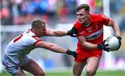2 July 2023; Ethan Doherty of Derry in action against Ruairí Deane of Cork during the GAA Football All-Ireland Senior Championship quarter-final match between Derry and Cork at Croke Park in Dublin. Photo by Piaras Ó Mídheach/Sportsfile