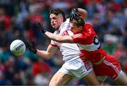 2 July 2023; Colm O'Callaghan of Cork in action against Brendan Rogers of Derry during the GAA Football All-Ireland Senior Championship quarter-final match between Derry and Cork at Croke Park in Dublin. Photo by Piaras Ó Mídheach/Sportsfile