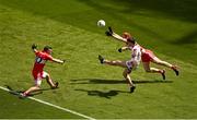 2 July 2023; Chris Óg Jones of Cork in action against Benny Heron and Conor Glass of Derry during the GAA Football All-Ireland Senior Championship quarter-final match between Derry and Cork at Croke Park in Dublin. Photo by Brendan Moran/Sportsfile