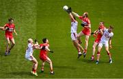 2 July 2023; Conor Glass of Derry and Colm O'Callaghan of Cork contest a kickout during the GAA Football All-Ireland Senior Championship quarter-final match between Derry and Cork at Croke Park in Dublin. Photo by Brendan Moran/Sportsfile