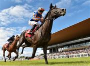 2 July 2023; Auguste Rodin, with Ryan Moore up, on their way to winning the Dubai Duty Free Irish Derby during day three of the Dubai Duty Free Irish Derby Festival at Curragh Racecourse in Kildare. Photo by Matt Browne/Sportsfile