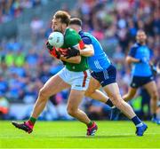 2 July 2023; Aidan O'Shea of Mayo is tackled by David Byrne of Dublin during the GAA Football All-Ireland Senior Championship quarter-final match between Dublin and Mayo at Croke Park in Dublin. Photo by Ray McManus/Sportsfile