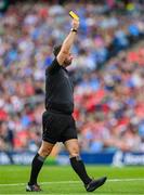 2 July 2023; Referee David Gough issues a yellow card, to James McCarthy of Dublin, during the GAA Football All-Ireland Senior Championship quarter-final match between Dublin and Mayo at Croke Park in Dublin. Photo by Ray McManus/Sportsfile