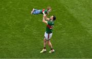 2 July 2023; Kevin McLoughlin of Mayo enjoys some time on the pitch with his daughter Saorla after the GAA Football All-Ireland Senior Championship quarter-final match between Dublin and Mayo at Croke Park in Dublin. Photo by Brendan Moran/Sportsfile