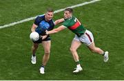 2 July 2023; Ciaran Kilkenny of Dublin is tackled by Eoghan McLaughlin of Mayo during the GAA Football All-Ireland Senior Championship quarter-final match between Dublin and Mayo at Croke Park in Dublin. Photo by Brendan Moran/Sportsfile