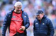 2 July 2023; Cork manager John Cleary, right, and his selector Kevin Walsh leave the pitch after their side's defeat in the GAA Football All-Ireland Senior Championship quarter-final match between Derry and Cork at Croke Park in Dublin. Photo by Piaras Ó Mídheach/Sportsfile